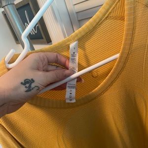 Lululemon size 8 yellow long sleeve shirt